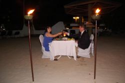 Honeymoon dinner on the beach after sunset