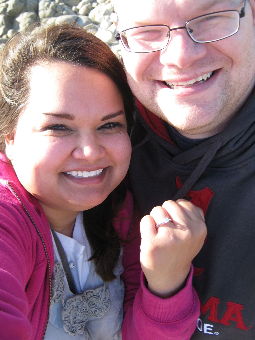 Selfie in the sun for newly engaged Christian singles. A woman shows off her engagement ring