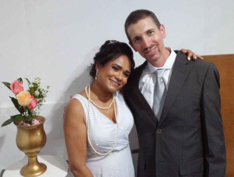 Brazilian formerly single Christian smiling with American Christian husband