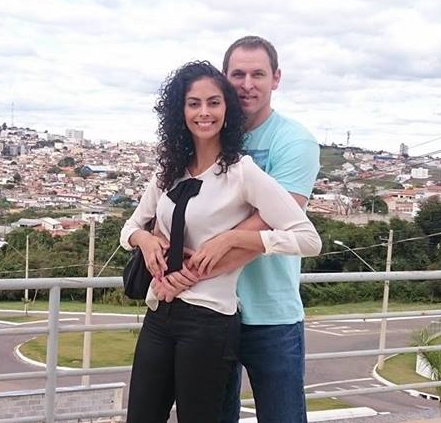 Texas Pastor hugs his elated Brazilian fiancee
