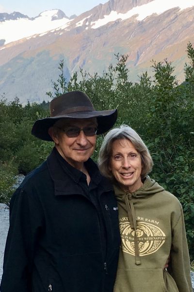Alaskan mountain scenery behind Christian couple