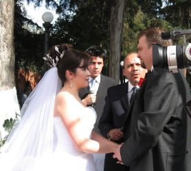 CT Christian ex-single faces his new bride from Mexico as they exchange their vows outdoors