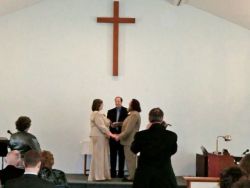 Cherie and James exchanging their vows