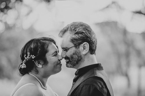 Tender marriage moment for couple getting ready to kiss