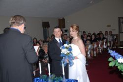 Former NC Christian single and GA Christian single at their wedding ceremony
