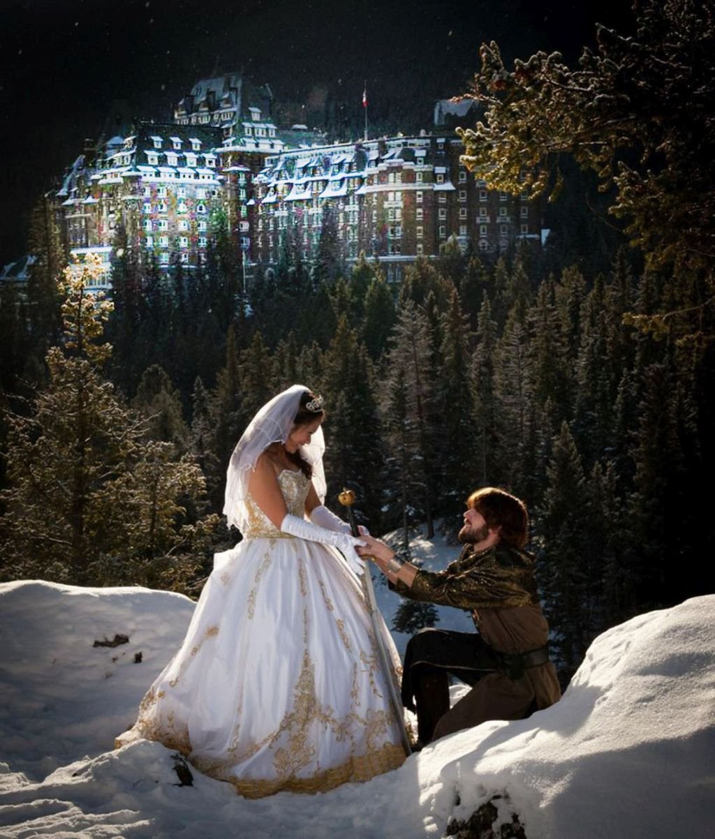 A man weds his princess in the snow at foot of Banff Springs Hotel