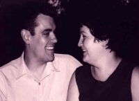 British Christian single laughs with her Australian Christian single man who laughs with her