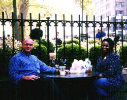 A couple enjoying a lunch date at an outdoor Cafe in New York