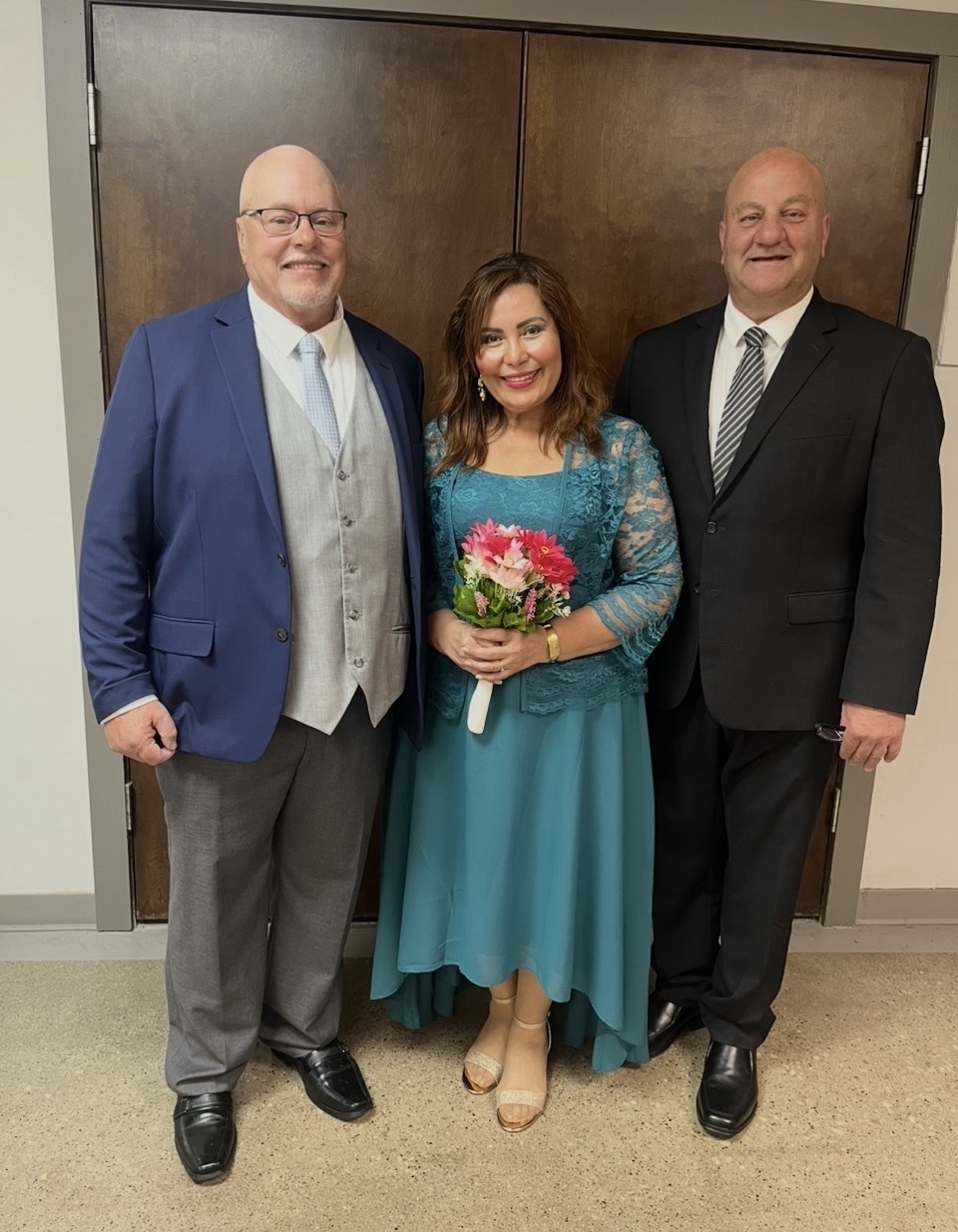 A proud Christian couple pose after marrying
