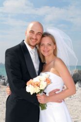 Attractive singles from Indiana tie the knot and pose outdoors near the ocean