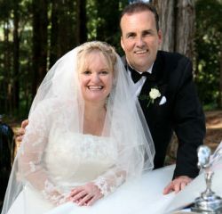 Australian Christians laugh together on their wedding day