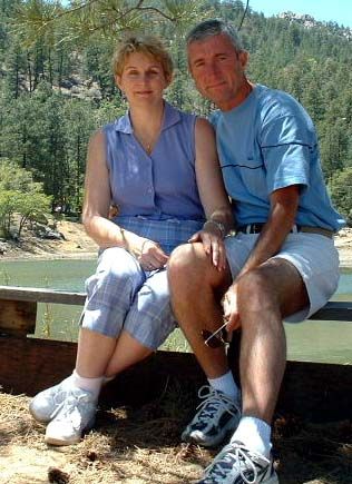 Divorced Christians find love. Couple sitting on bench on nature hike