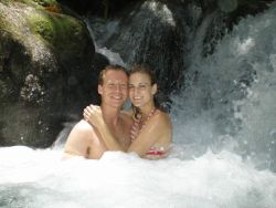 Honeymoon under a waterfall for Christian couple