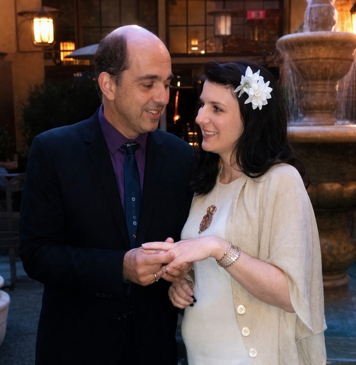 Smiling California Christian puts wedding ring on his new California bride