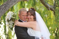 Former Australian Christian singles hug and smile broadly after marrying