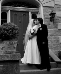 Dream wedding for Christian couple who kiss on the stairs outside church