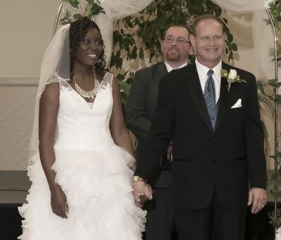 Pastor announces newlyweds behind beautiful Christian newlyweds