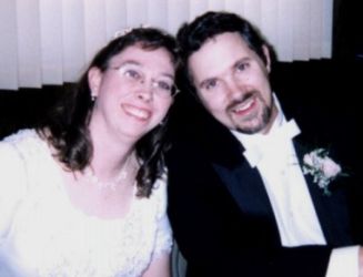 Happy Born Again Christians sitting together after marrying
