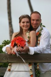 Hawaiian Christian singles marry and pose on a bridge