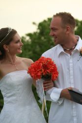 Christian couple laughing at their wedding