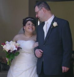 Overjoyed Christian bride smiles at her new husband